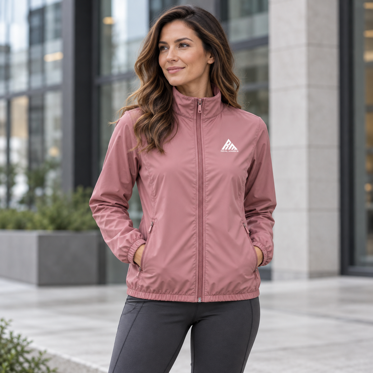Woman wearing the Real Marks lightweight zip jacket in dusty rose