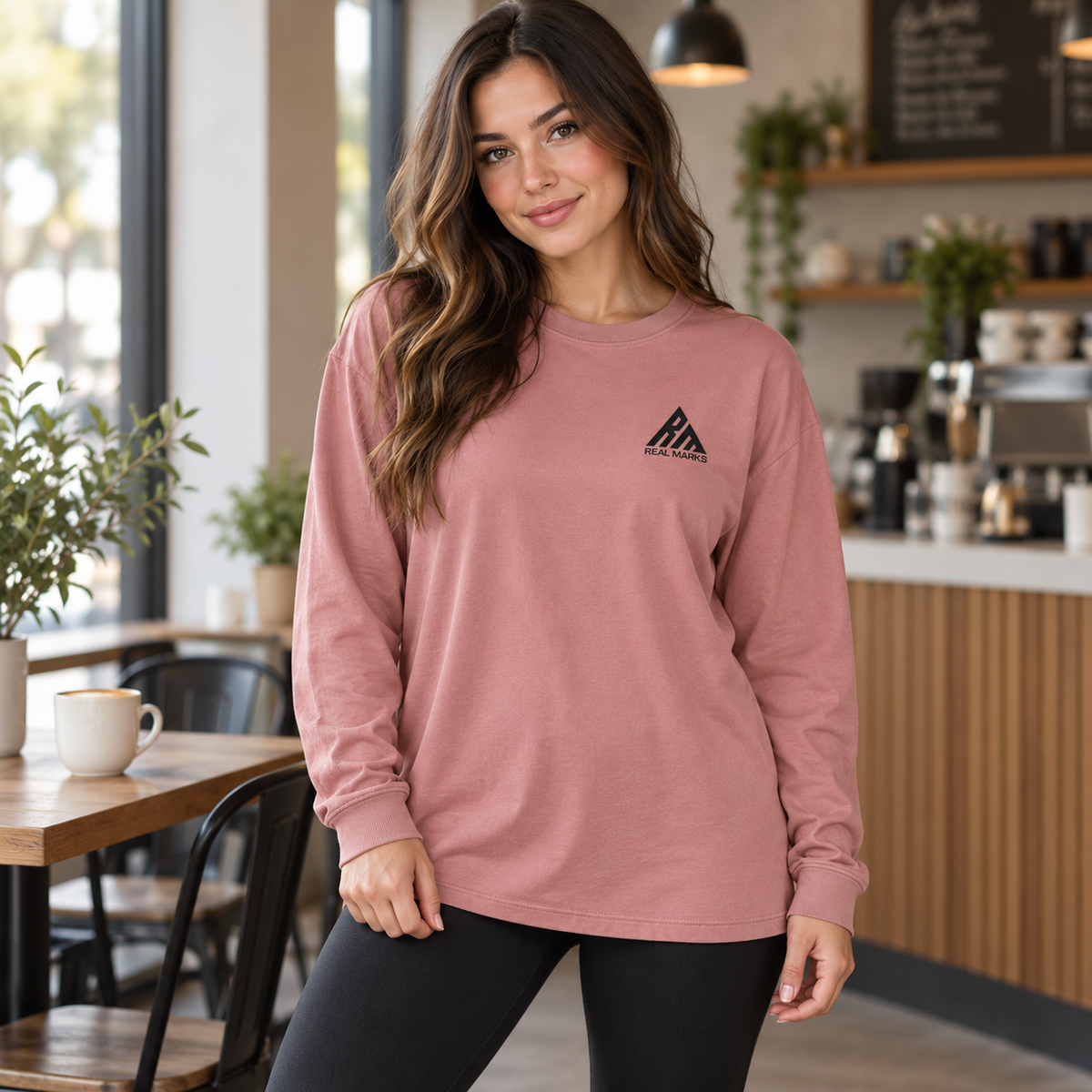 Woman wearing a dusty rose Real Marks Women's Relaxed Long-Sleeve T-Shirt