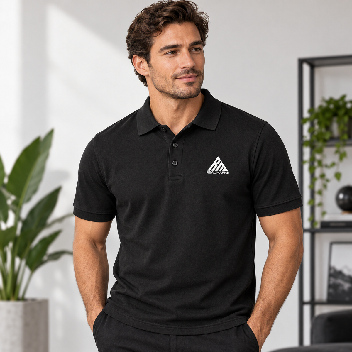 Male model wearing the black Real Marks Classic Logo Polo