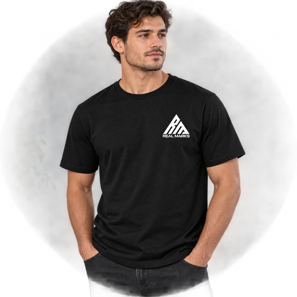 Model wearing black Real Marks Essential Logo T-Shirt