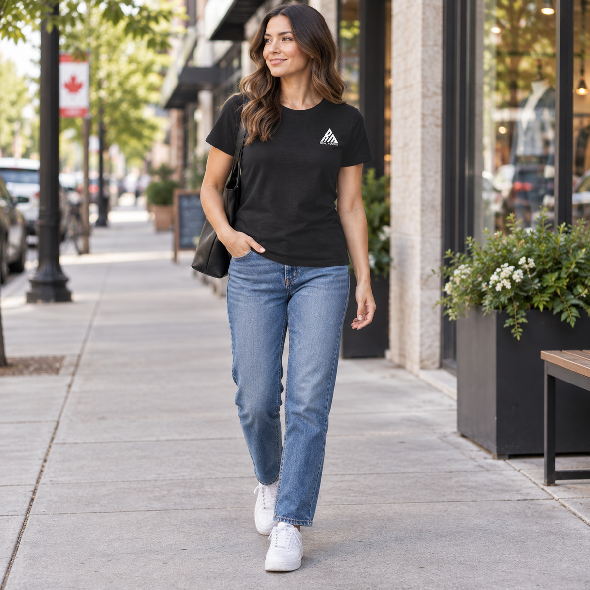 Woman wearing the black Real Marks women's essential logo T-shirt