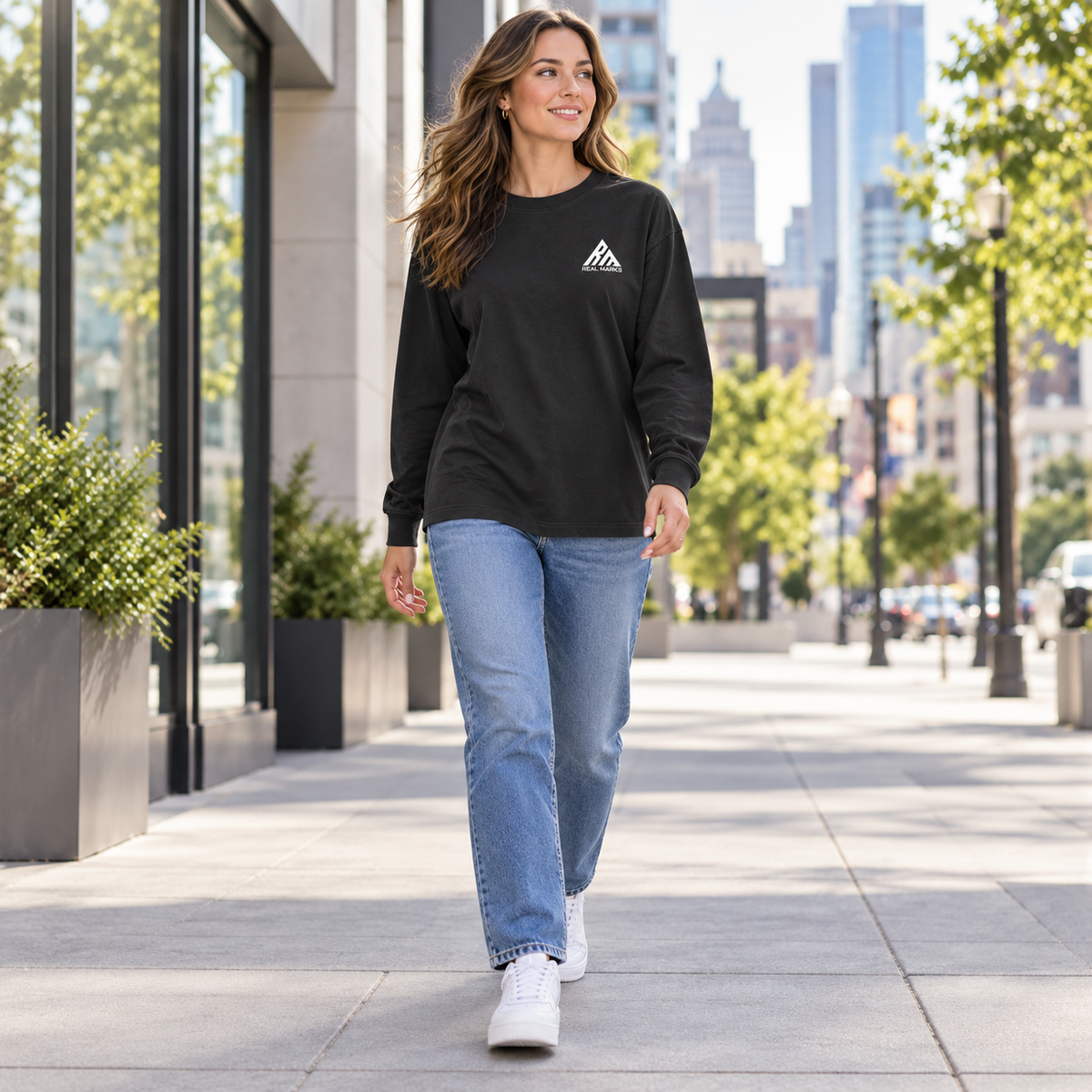 Woman wearing a black Real Marks Women's Relaxed Long-Sleeve T-Shirt