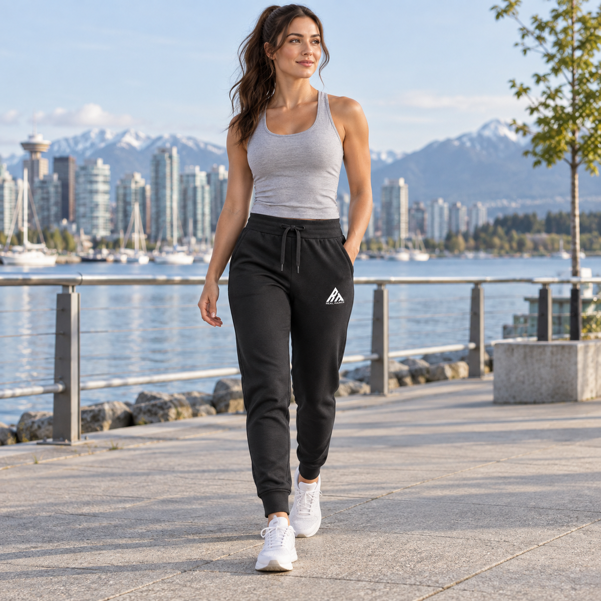 Woman wearing Real Marks tapered everyday joggers in black